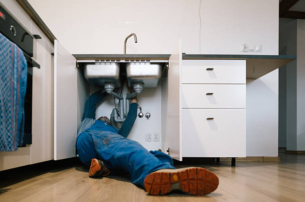 Professional Drain Cleaning technician working in Highland, CA